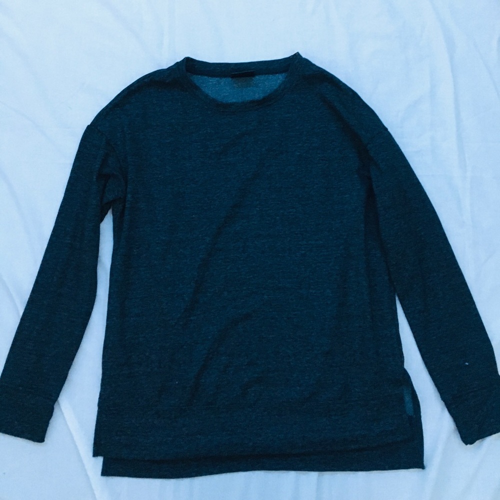 Dark grey sweater.